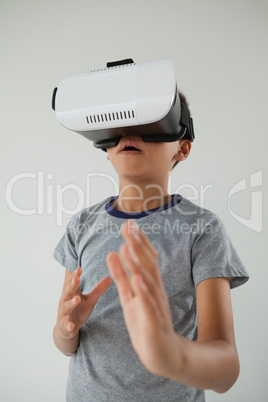 Schoolboy using virtual reality headset