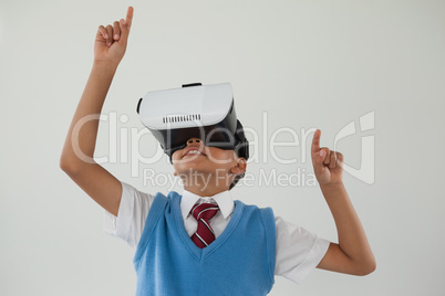 Schoolboy using virtual reality headset