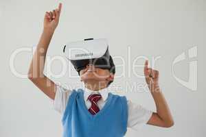 Schoolboy using virtual reality headset