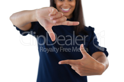 Female executive forming a finger frame