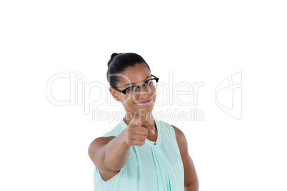 Businesswoman pointing her finger at the camera