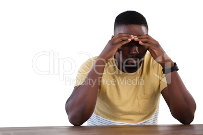 Upset man against white background