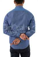 Rear view of businessman with crossed fingers