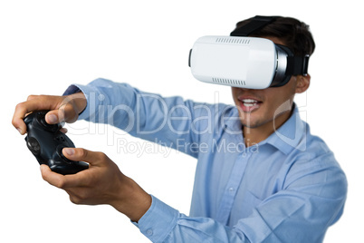 Creative young businessman wearing vr glasses while video game