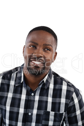 Man smiling against white background