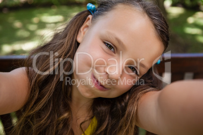 Portrait of playful girl making face