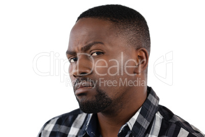 Confused man against white background