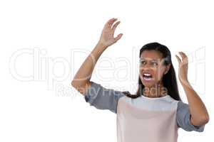 Businesswoman shouting against white background