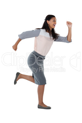 Businesswoman running against white background