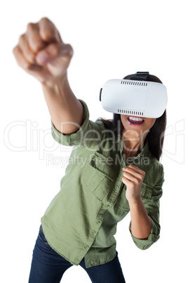 Woman gesturing while using virtual reality headset