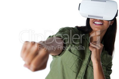 Woman gesturing while using virtual reality headset