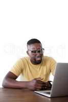 Man using laptop against white background