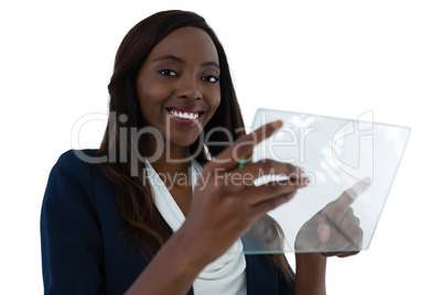 Portrait of smiling young businesswoman holding interface screen