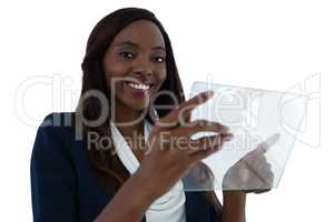 Portrait of smiling young businesswoman holding interface screen