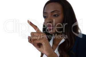 Close up of businesswoman touching invisible screen