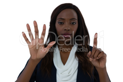 Portrait of businesswoman using invisible interface screen