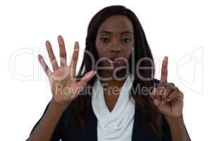 Portrait of businesswoman using invisible interface screen