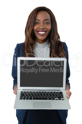 Portrait of businesswoman showing laptop