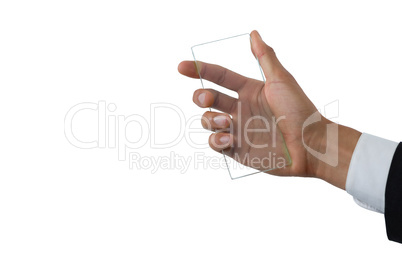 Cropped image of businessman holding transparent interface