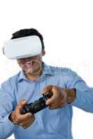 Young businessman wearing vr glasses while playing video game
