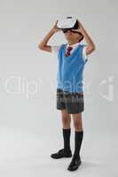 Schoolboy using virtual reality headset