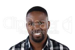 Happy man standing against white background