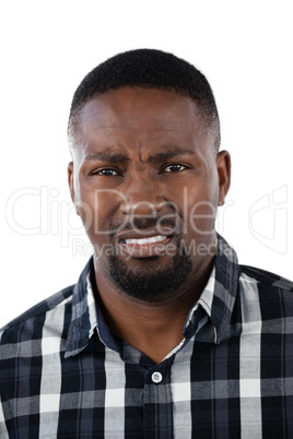 Confused man against white background