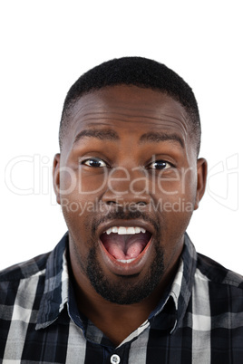 Surprised man against white background