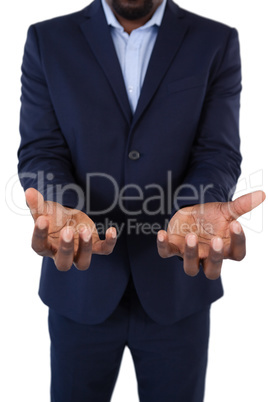 Helpless businessman showing his hands