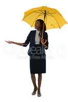 Smiling businesswoman holding umbrella