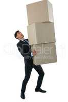 Full length businessman carrying cardboard boxes
