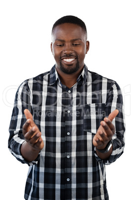 Man gesturing against white background