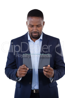 Businessman using a glass digital tablet