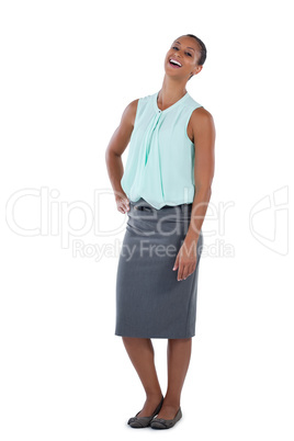 Businesswoman laughing against white background