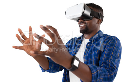 Man gesturing while using virtual reality headset