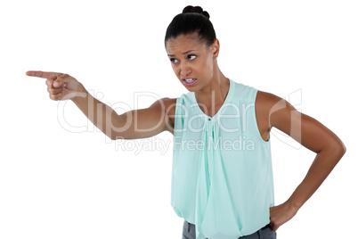 Angry businesswoman pointing