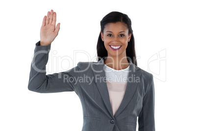 Businesswoman raising her hand