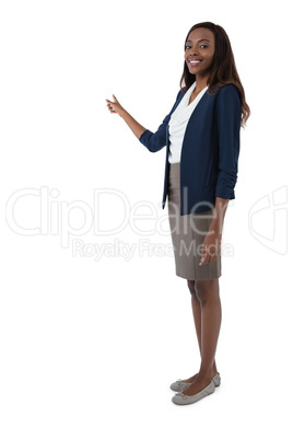 Full length portrait of businesswoman giving presentation