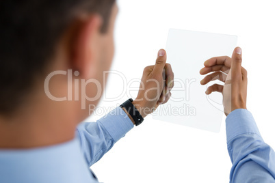 Cropped image of businessman using transparent glass interface