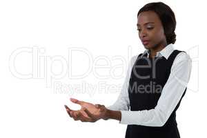 Young businesswoman with hands cupped