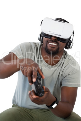 Man using virtual reality headset and playing video game