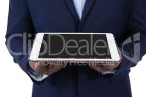 Businessman holding digital tablet