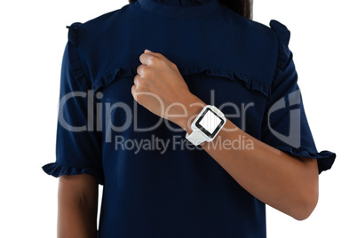 Female executive showing her smartwatch