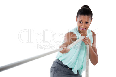 Businesswoman pulling the rope