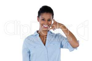Businesswoman pretending to talk on a cell phone