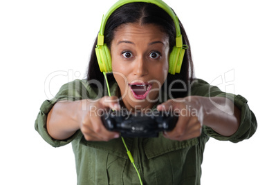 Woman making funny faces while playing video games