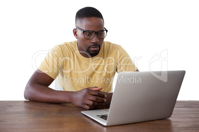 Man using laptop against white background