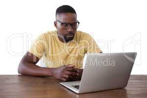 Man using laptop against white background