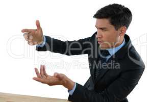 Close up of businessman gesturing during meeting