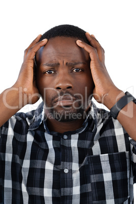 Confused man against white background